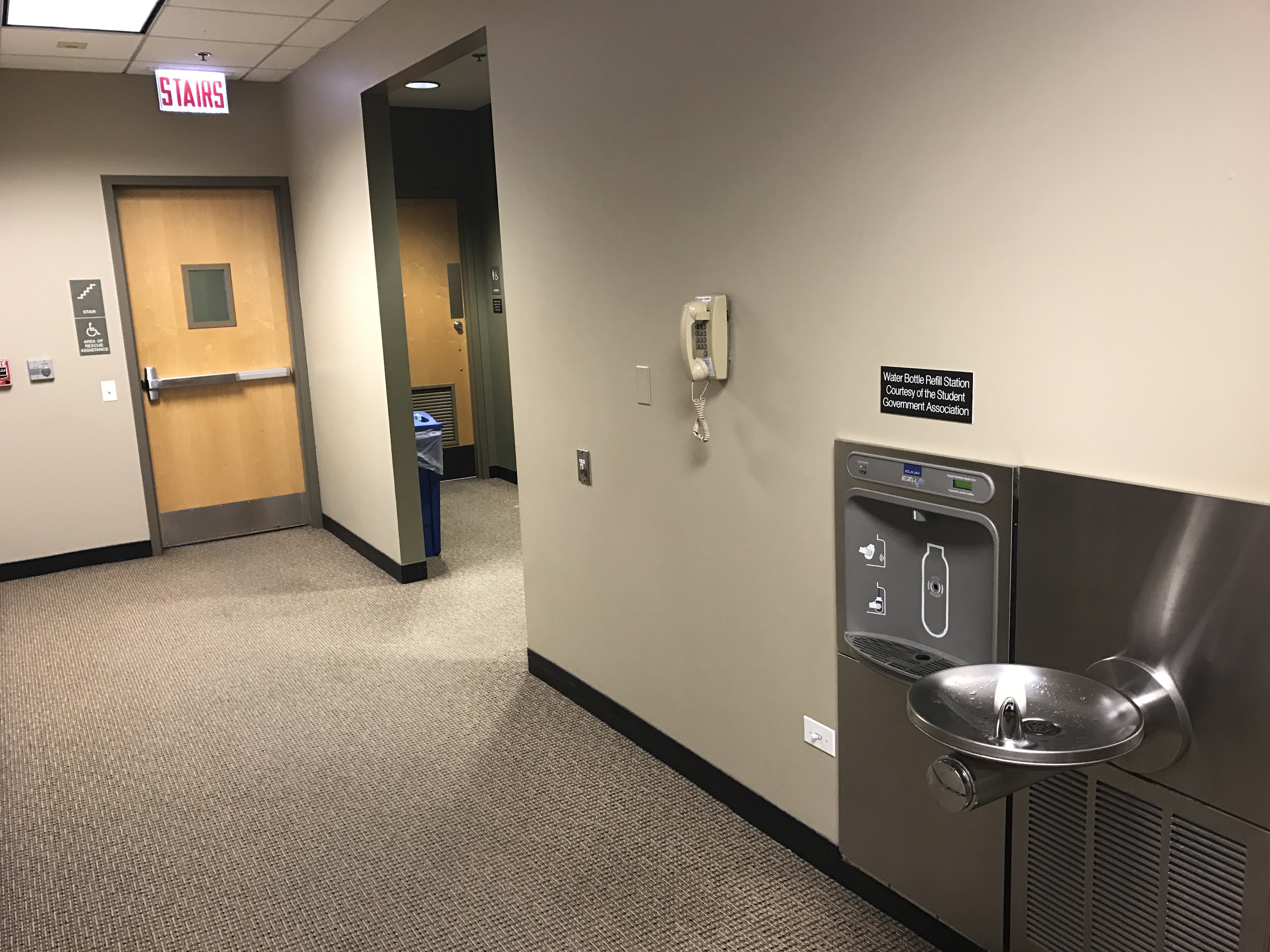 Entrance to east restroom and water fountain. 