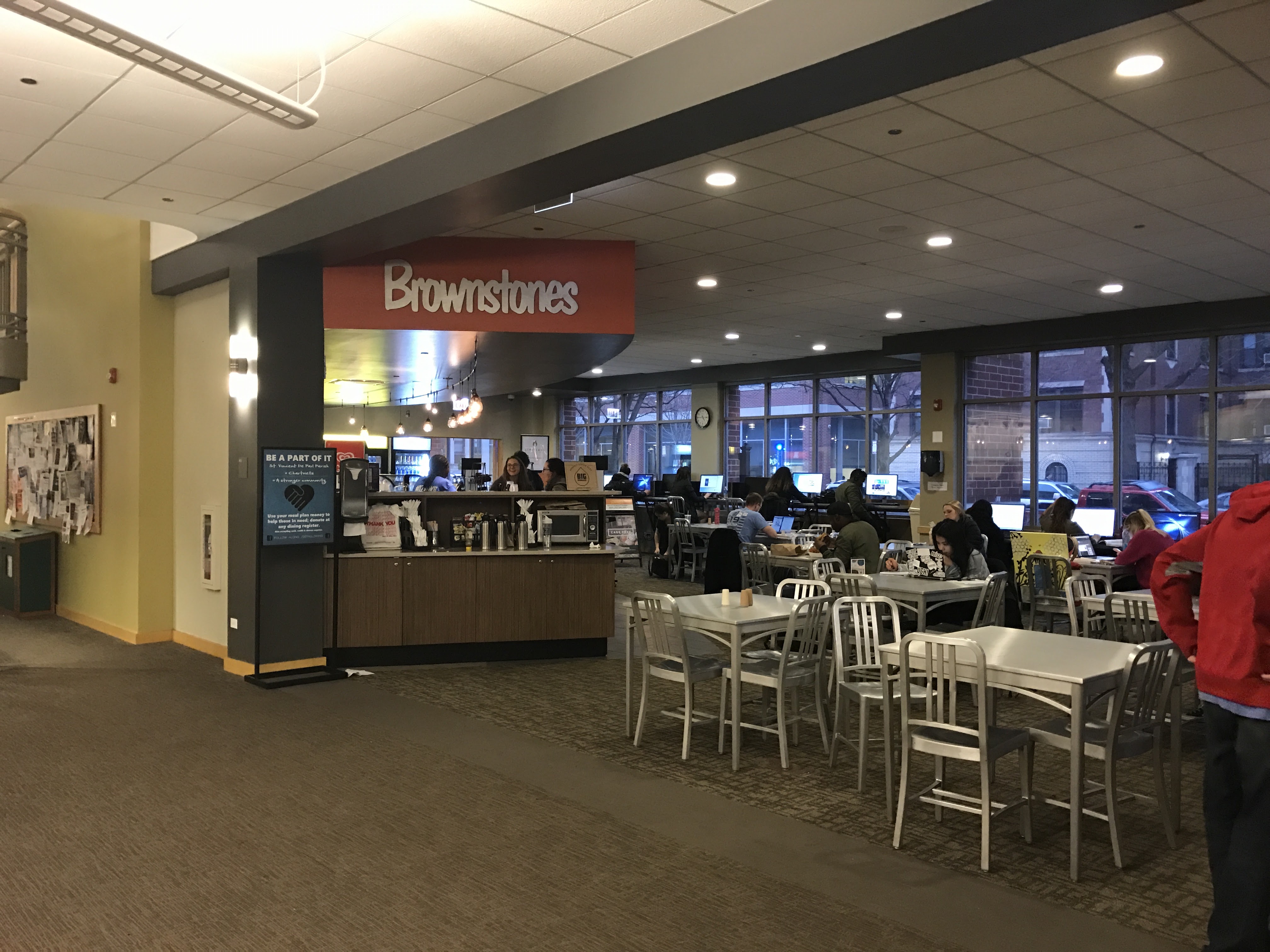 Indoor coffee shop with seating.