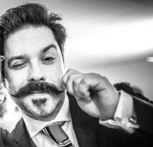 Jeffrey A. McGuire twirling his mustache as he makes evil/not-evil plans.