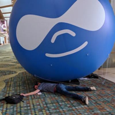 Daniel Cothran squashed by inflatable Druplicon